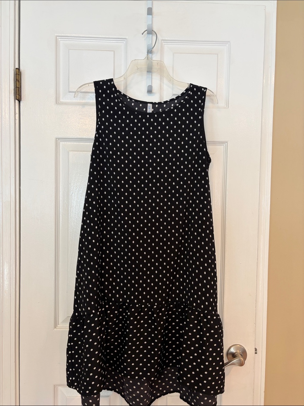 Sleeveless Black Polka Dot Midi Dress with Ruffle Hem